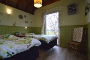 Pipowagen Juffertje in het Groen, slaapkamer met 2 bedden